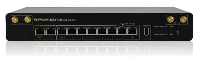 The picture shows the Ascend Multi-Cellular HD4, a router for bundling multiple cellular connections for higher bandwidth and greater availability of Internet connections. The router is housed in a compact black casing and has several antenna connections for connecting to mobile networks. The router can use SIM cards from different providers and also supports the aggregation of LTE, 5G and Wi-Fi connections. The Ascend Multi-Cellular HD4 is particularly useful for companies and organizations that require high bandwidth and reliability of Internet connections, e.g. for the use of cloud services or for accessing enterprise applications. The router offers extensive functions for managing network connections and setting up VPNs for secure communication