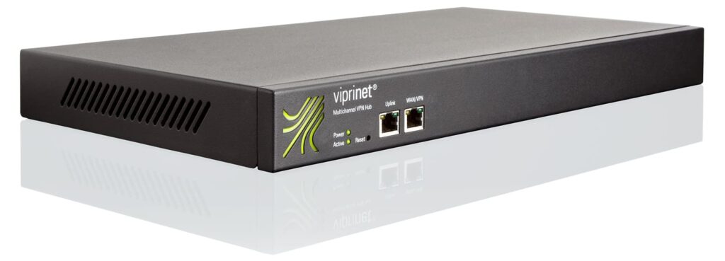 The picture shows the Ascend Viprinet Multichannel VPN Hub 01-01020. The hub is a technical device with many connections and antennas. It has a rectangular housing with rounded corners and is mostly transparent so that you can see the various components inside. The hub stands on a white background and the cable connections are clearly visible.