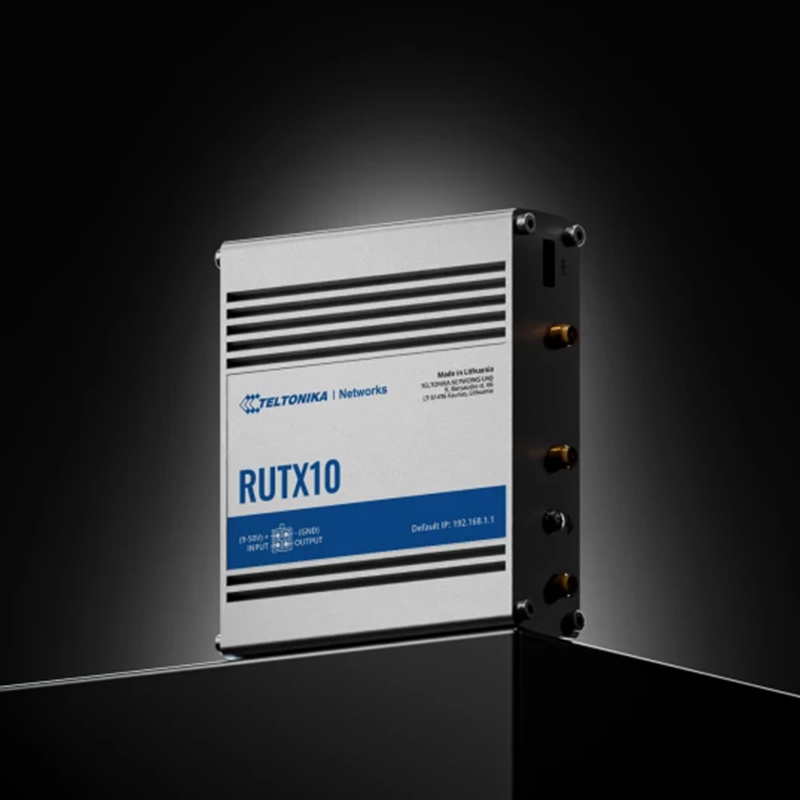 Router Teltonika RUTX10 sobre fondo oscuro.