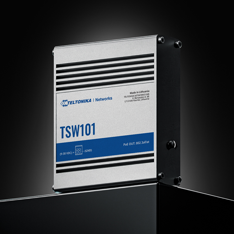 Industrieller Netzwerk-Switch TSW101 auf dunklem Hintergrund.